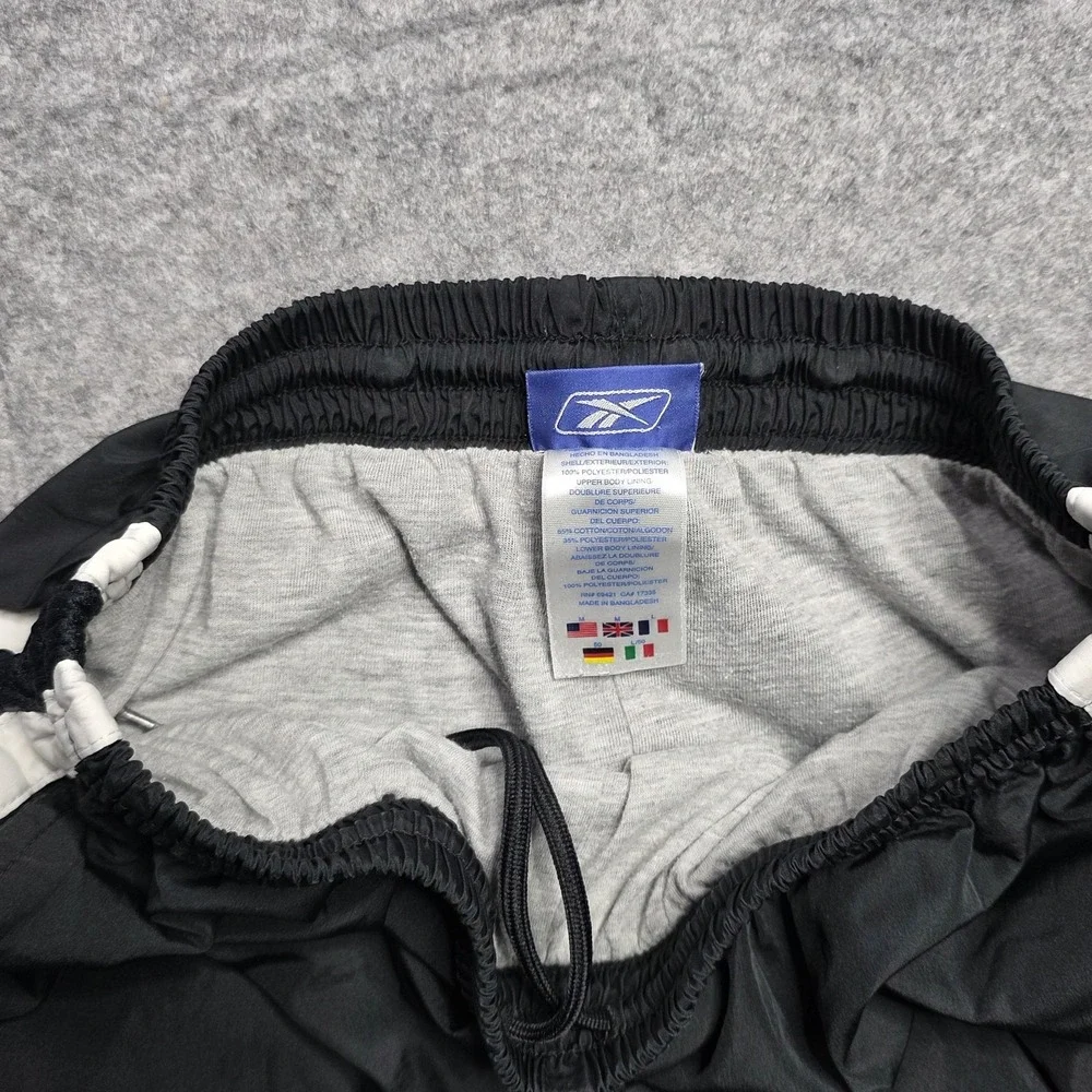 Reebok Pants‎ Mens Large Black Track Warm Up Athletic Side Stripe Zip Hem Lined